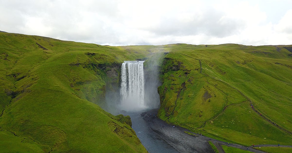 Skógafoss waterfall in South Iceland near Eyvindarholt Hill House and ...